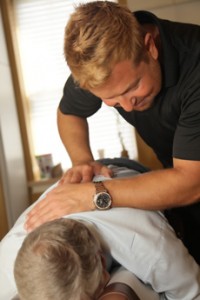 Dr. Mark Kosinsky working | Top Chiropractor 